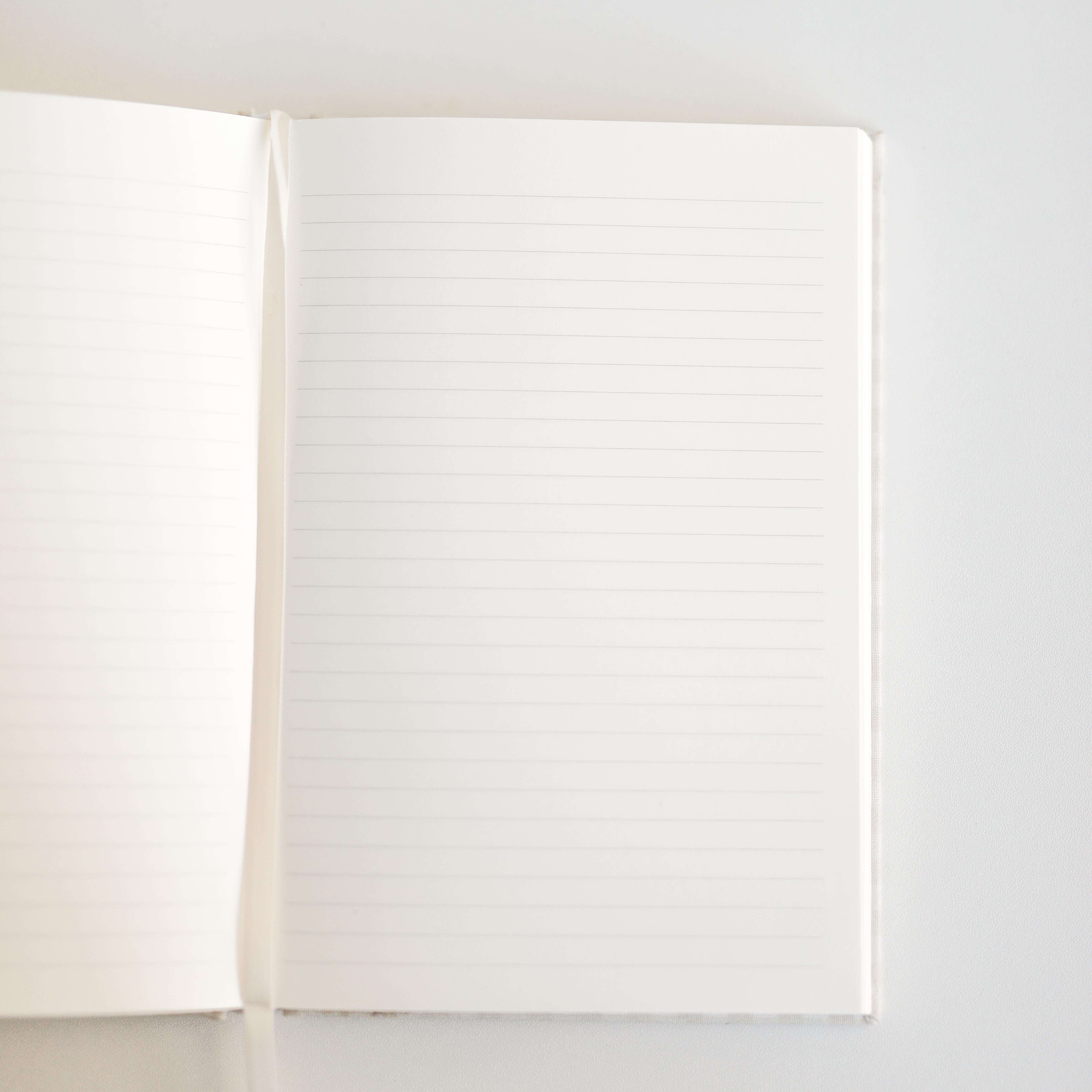 Open notebook with lined pages 